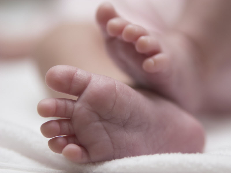 Close-up of a newborn baby’s feet