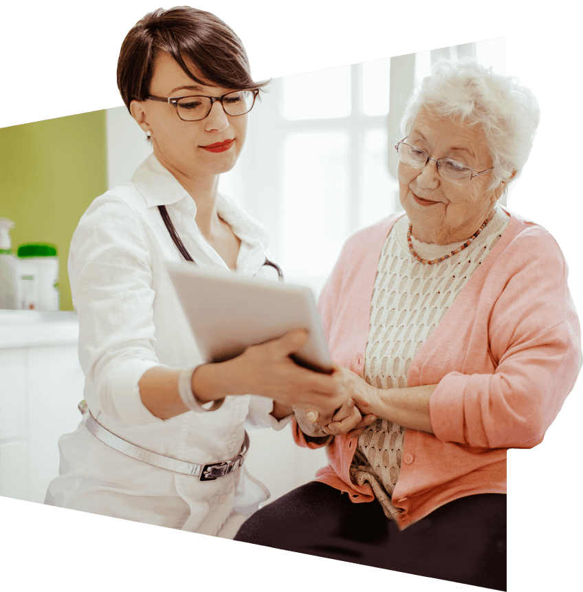 Doctor reviewing a medical chart with her elderly patient.